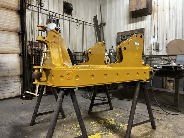 heavy-duty loader arm for a wheel loader.